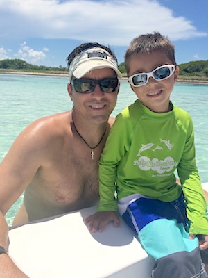 Image 4 - Ben with oldest son Kye for a day on the water. 